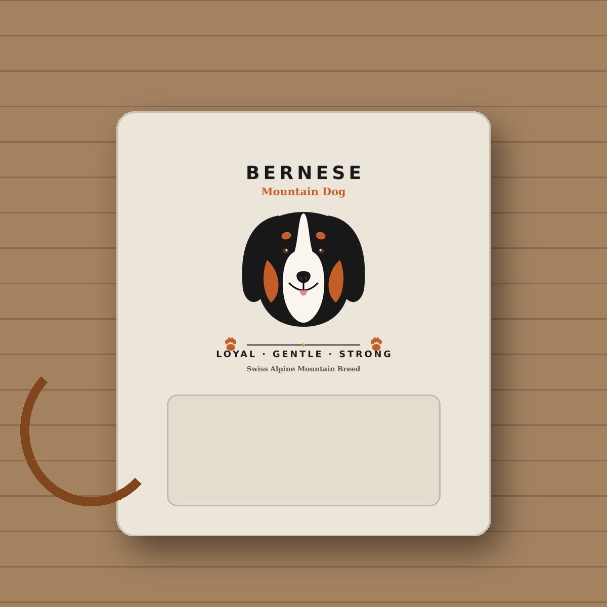 Bernese Mountain Dog SVG cut file heat-transfer vinyl on heather oatmeal heavyweight hoodie on rustic wooden table with leather dog leash